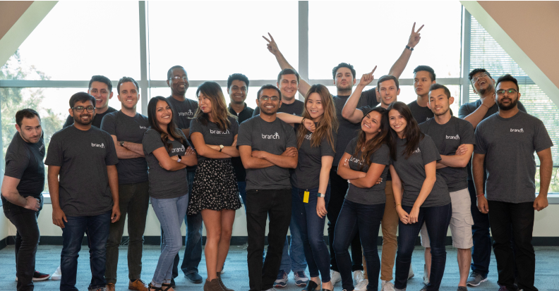 team of diverse people wearing branch tshirts